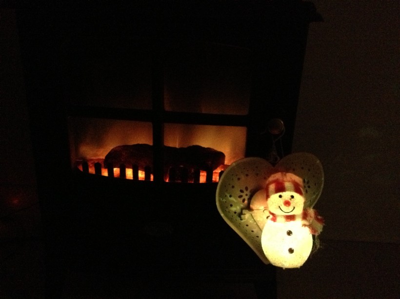 Snowman by the fire